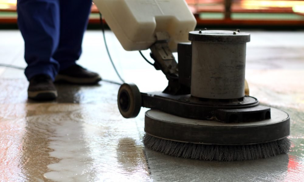 Cleaning machine washing the floor in a shopping mall